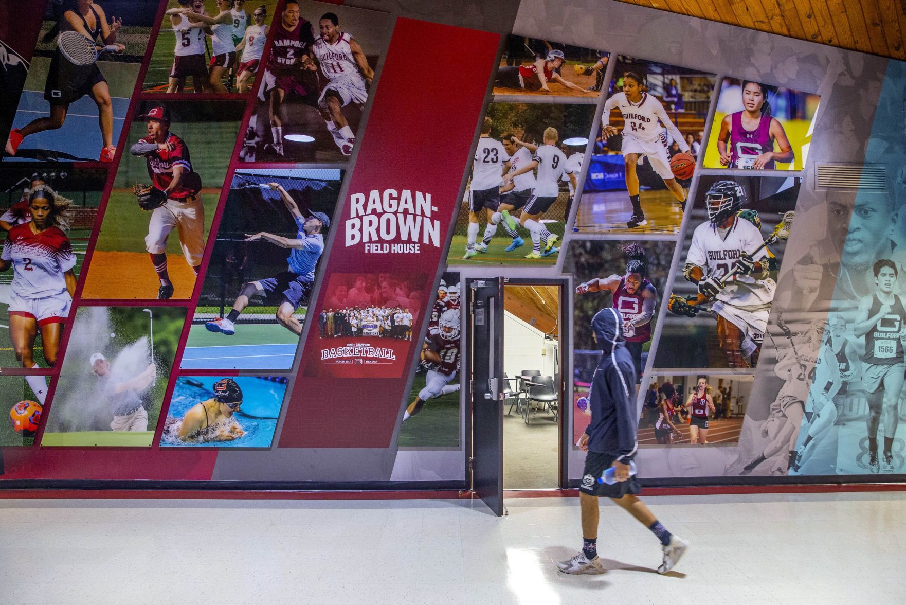 Guilford College renovated lobby features athletics photos
